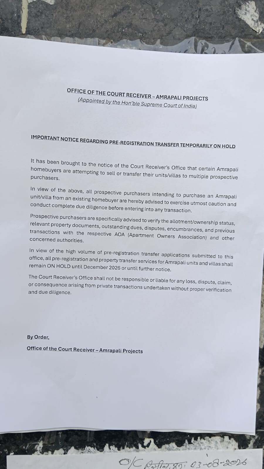 Photograph of the Office of the Court Receiver – Amrapali Projects notice regarding pre-registration transfer temporarily on hold